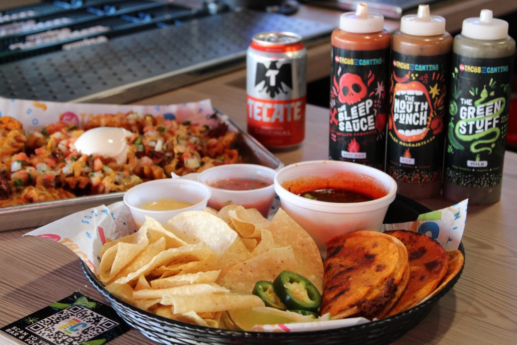 Ted's Tacos and Cantina's Wet Wet Taco, Loaded Waffle Fries, Sauces and Tecate